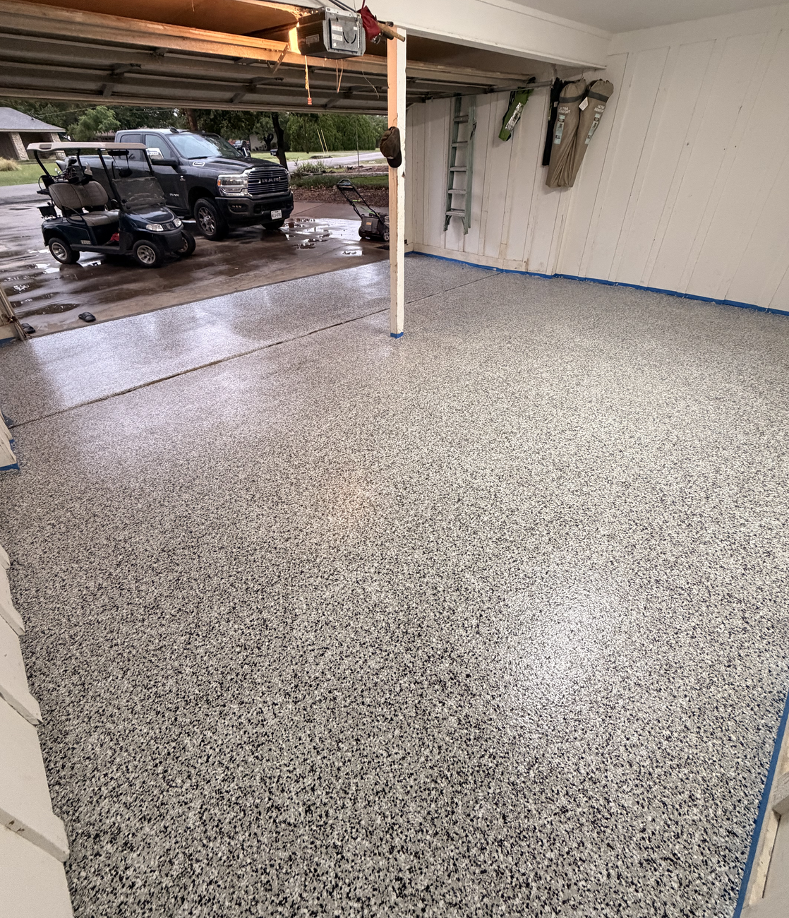 A finished flake garage floor by Happy Slab Coatings in Granbury, TX