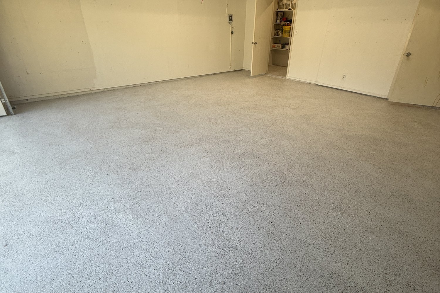 After: garage floor toward the interior room