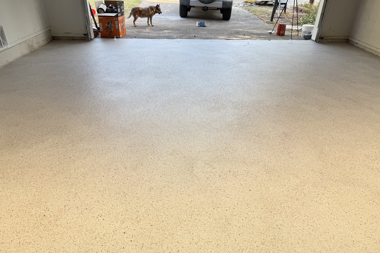 After: garage floor looking out the open door