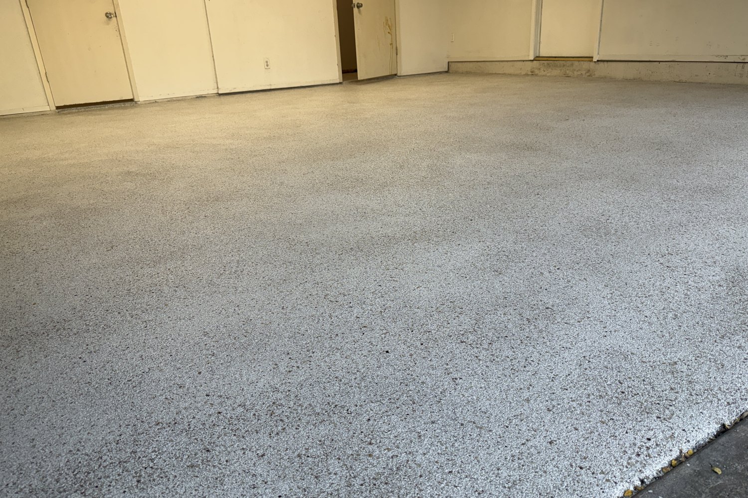 After: garage floor at the back doors