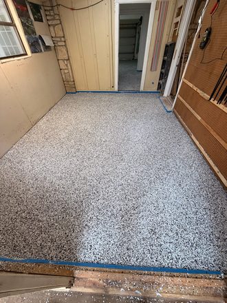 Finished flake garage floor by Happy Slab Coatings