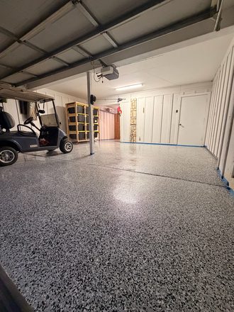 Finished flake garage floor by Happy Slab Coatings