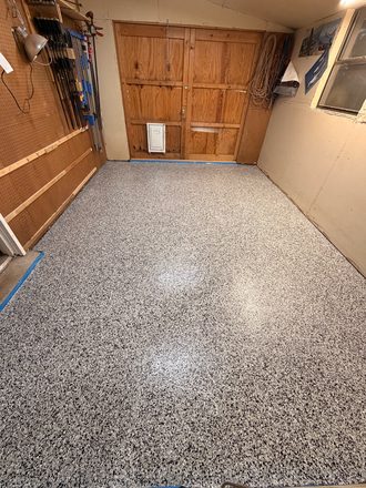 Finished flake garage floor by Happy Slab Coatings