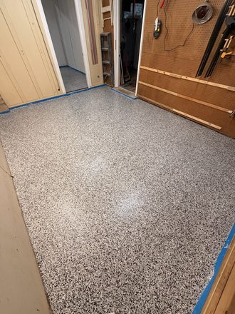 Finished flake garage floor by Happy Slab Coatings