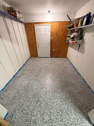 Finished flake garage floor by Happy Slab Coatings