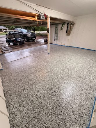 Finished flake garage floor by Happy Slab Coatings