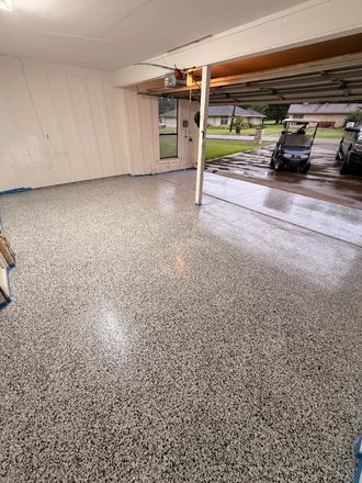 Finished flake garage floor by Happy Slab Coatings