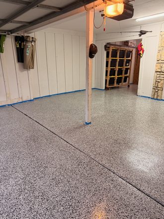Finished flake garage floor by Happy Slab Coatings