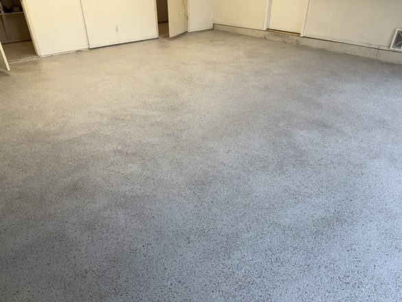 Finished flake garage floor by Happy Slab Coatings