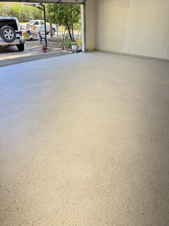 Finished flake garage floor by Happy Slab Coatings