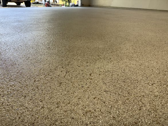 Finished flake garage floor by Happy Slab Coatings