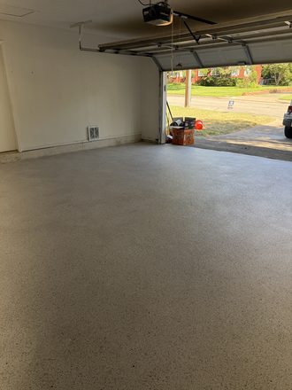 Finished flake garage floor by Happy Slab Coatings