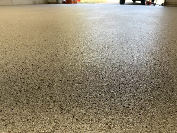 Finished flake garage floor by Happy Slab Coatings