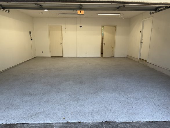 Finished flake garage floor by Happy Slab Coatings