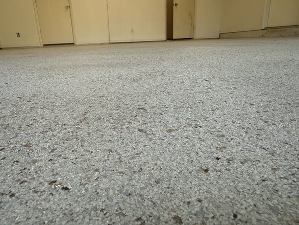 Finished flake garage floor by Happy Slab Coatings
