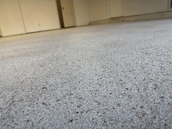 Finished flake garage floor by Happy Slab Coatings