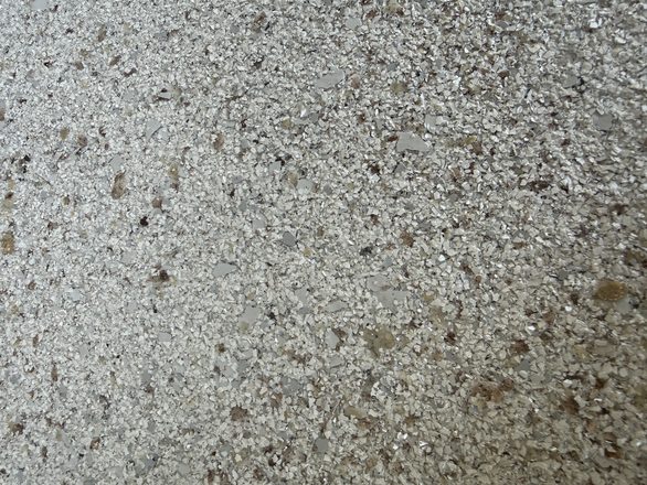 Finished flake garage floor by Happy Slab Coatings