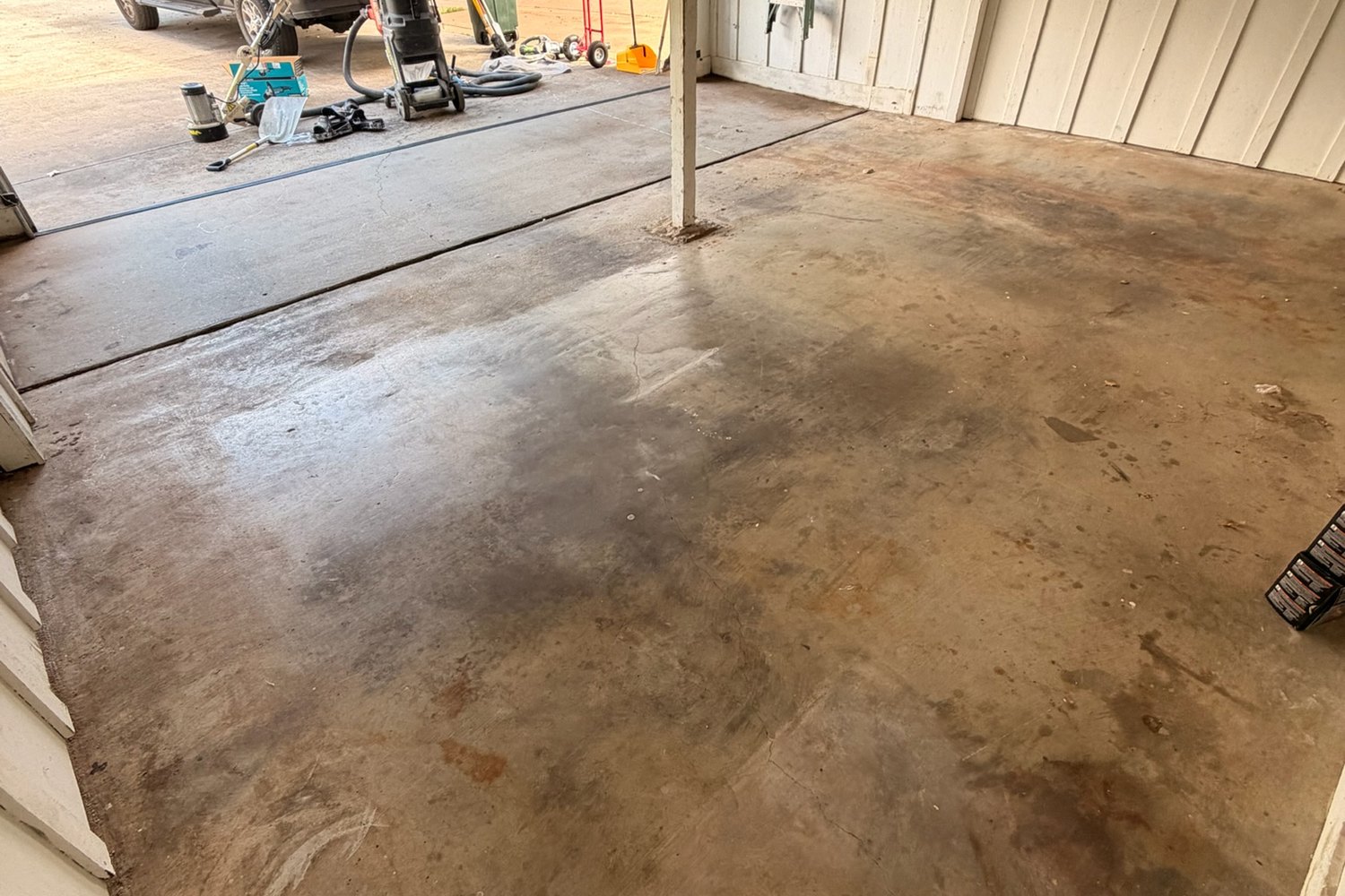 Before: garage looking out toward the vehicles