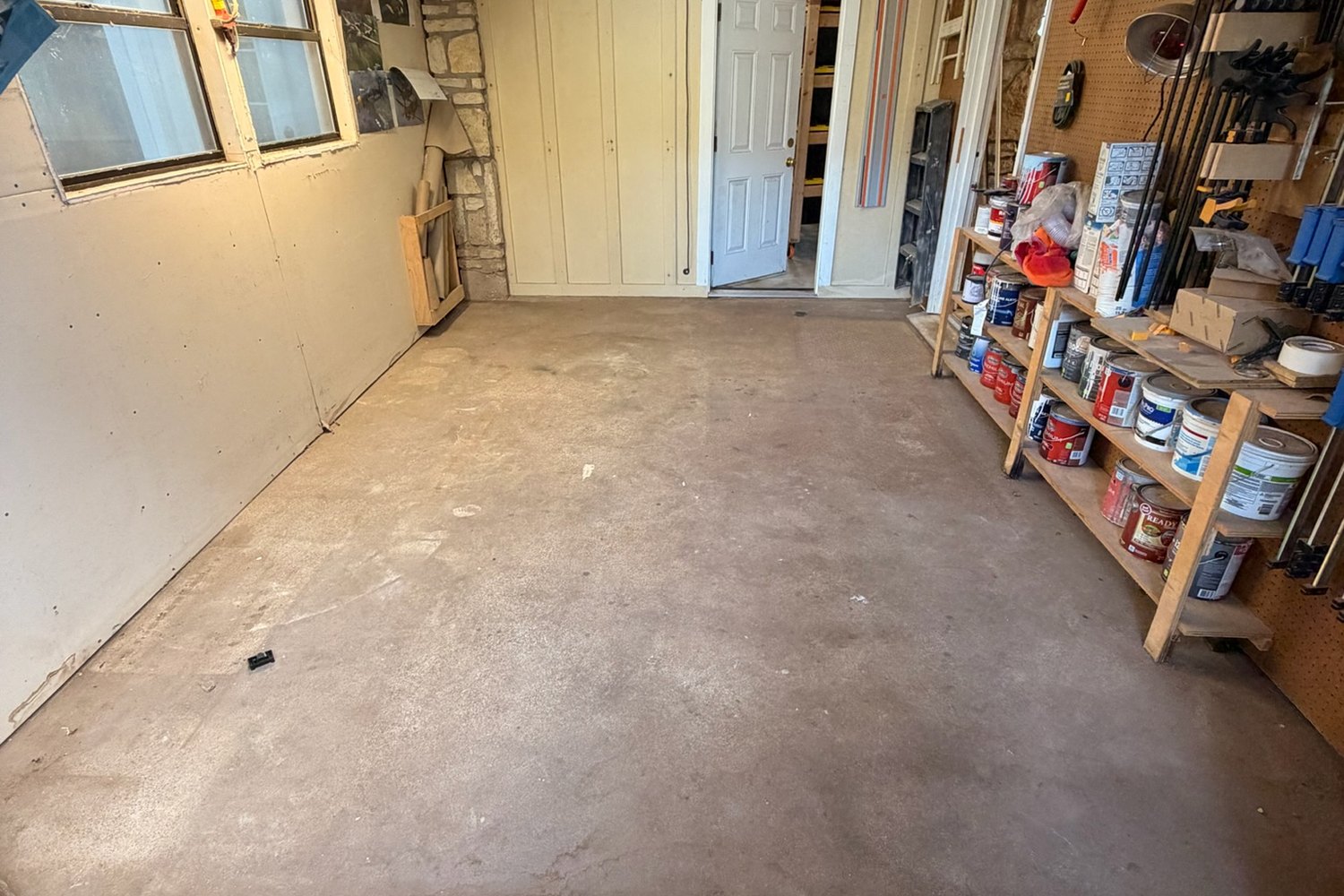 Before: golf cart garage corner by the shelving